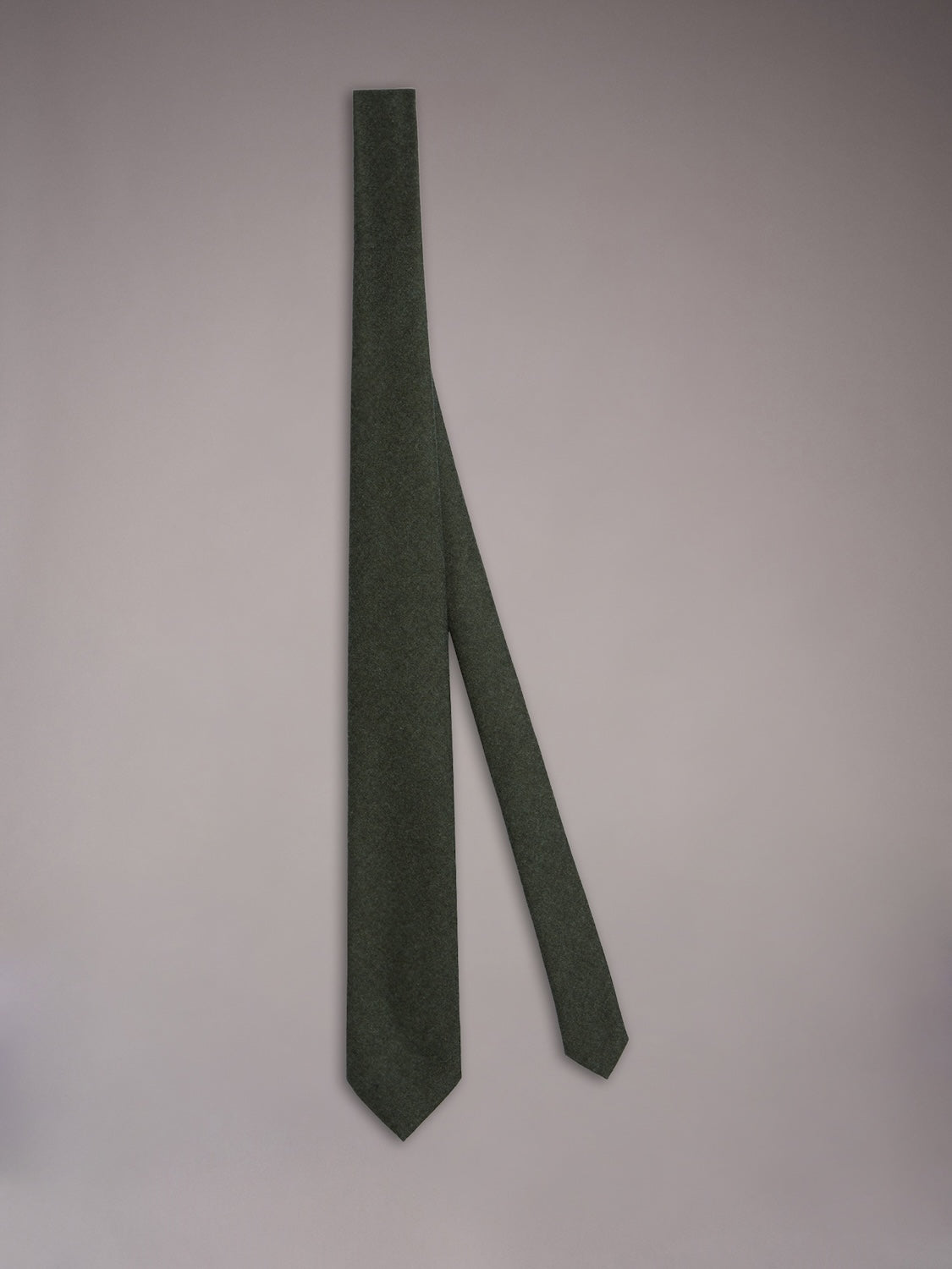 Tie in green wool