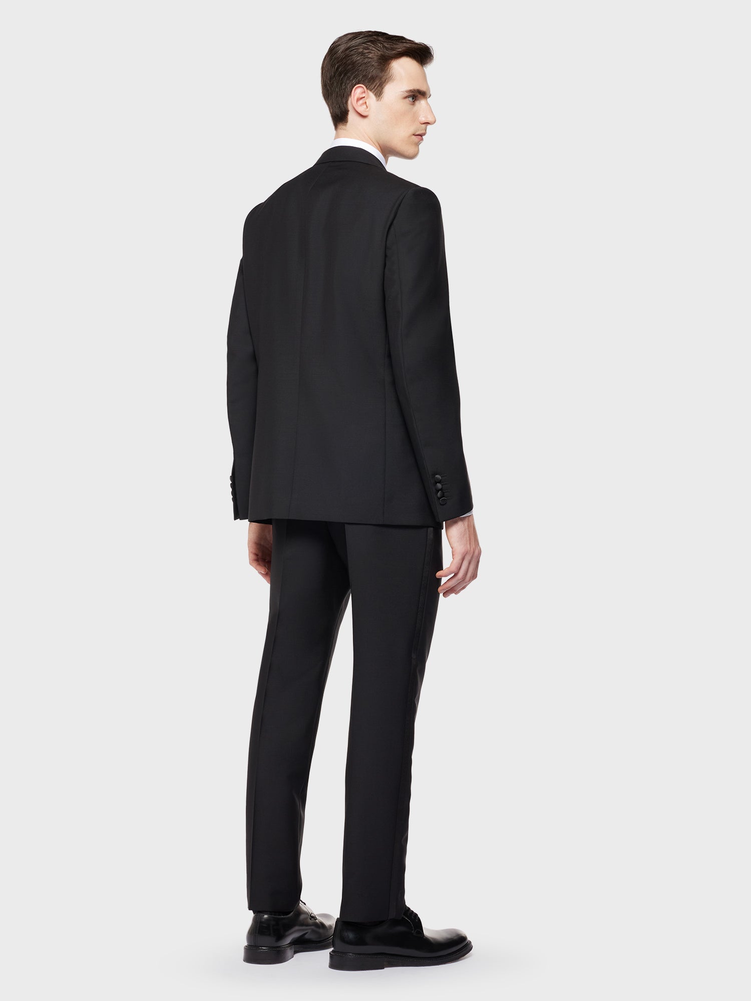 Caruso Menswear Abbigliamento Uomo Abito smoking norma in lana mohair nero indossato